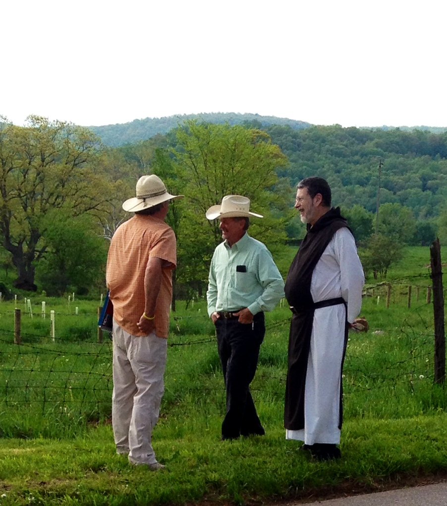 George Patterson, left and Father Robert, right discussing the stream fencing project with CBF contractor, Bobby Whitescarver