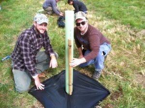 Kyle Switzer and Cam Morton of James Madison University planted a bare-root tree seedling with a four foot "Tubex" tree shelter. They also used a 3'X3" turf mat. 